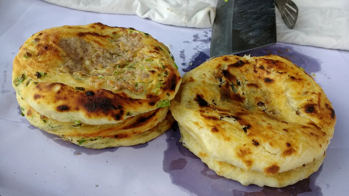 Freshly baked Xizhou baba flatbreads for sale in Dali