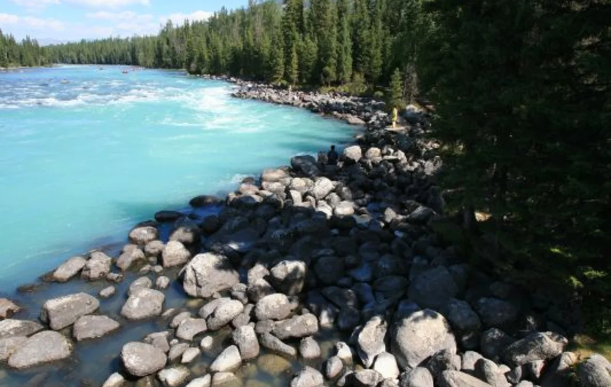 Turquoise lake and forest in northern Xinjiang