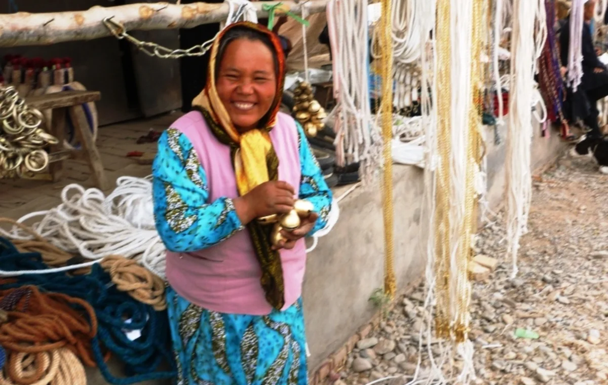 A market vendor with rope goods in Kashgar
