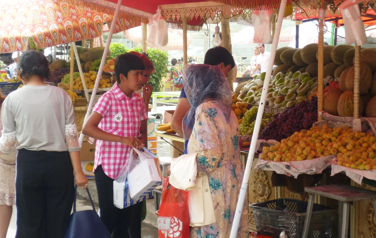 Street vendors and visitors in Kashgar old town