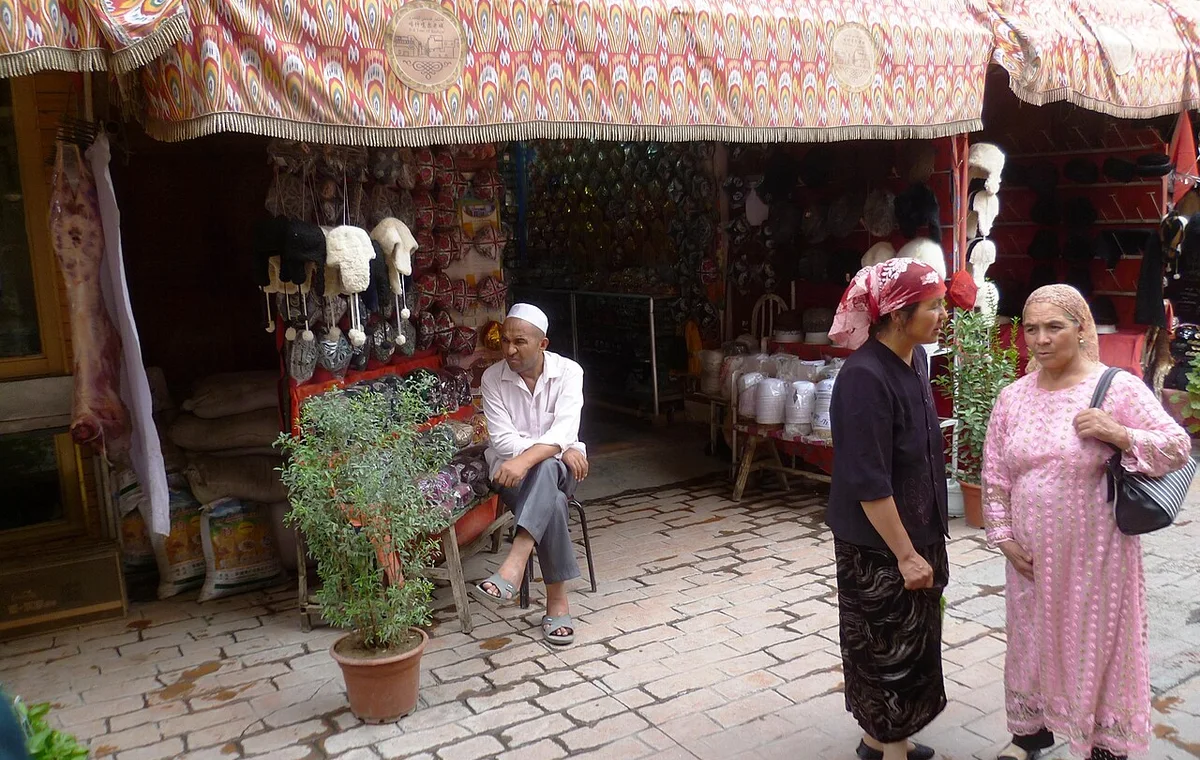 People in a Kashgar old-town street scene