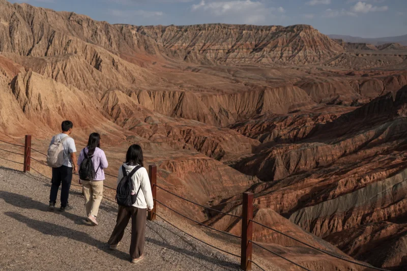 Travelers at the Dushanzi Grand Canyon overlook