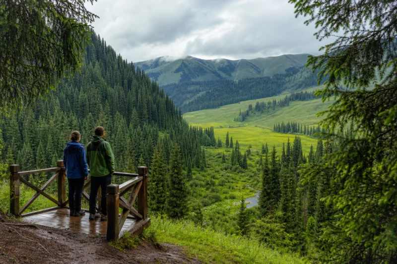 Travelers overlooking Kurdining Valley after rain
