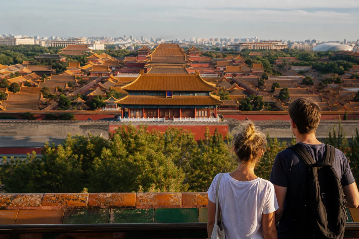 Travelers looking across the Forbidden City from Jingshan Park